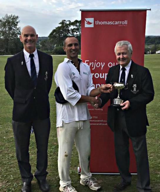Narberth 2nds skipper Davy Jones receives the Division 2 trophy