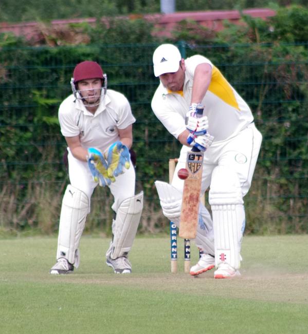 Andrew Palmer plays a defensive shot for Tish