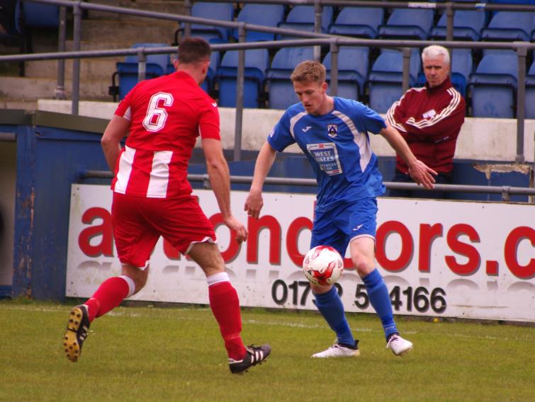 Rhys Dalling grabbed a late winner, here he is taking on Undy Athletic defender Rhys Aherne