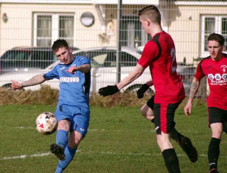 Justin Harding has a shot at goal for Hakin at Pennar
