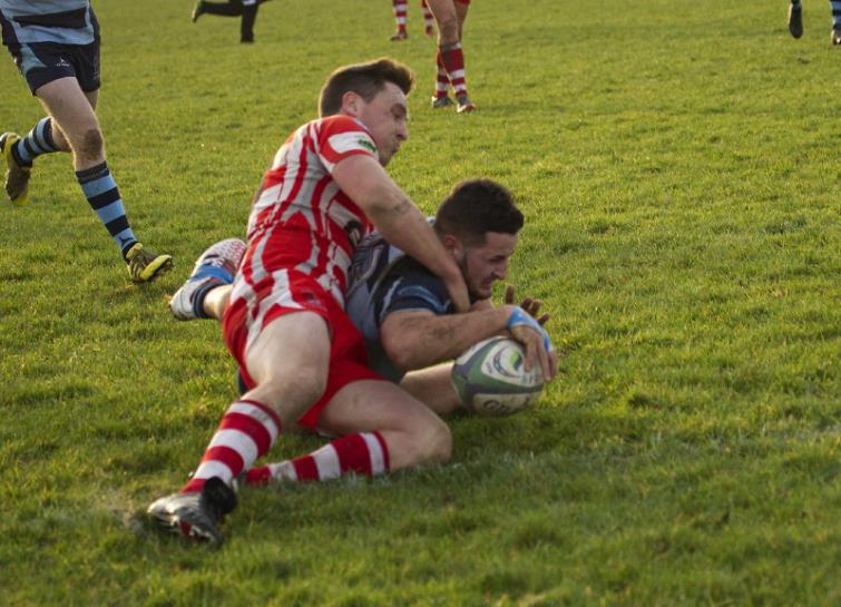 Jack Price stretches over for a try. Picture by Elwyn Davies.