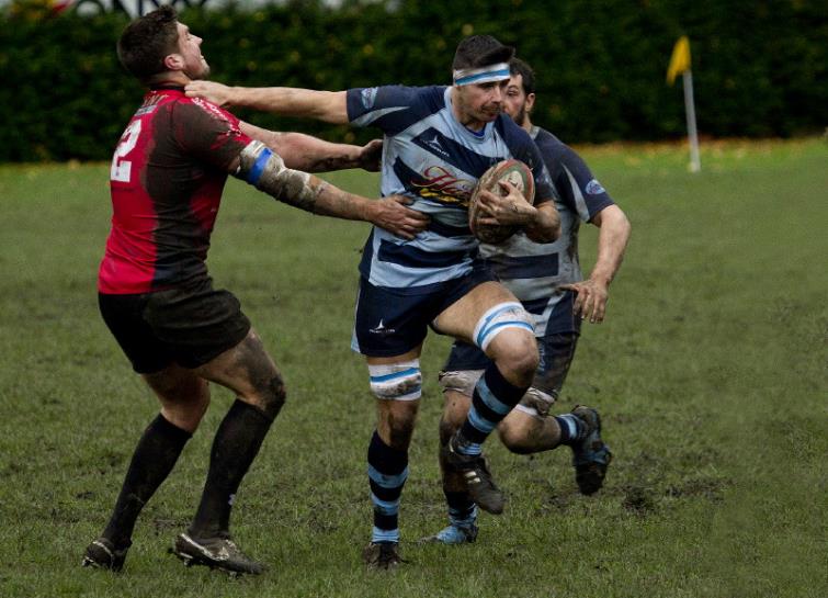 Narberths Steffan Phillips handing off an opponent. Picture by Elwyn Davies.