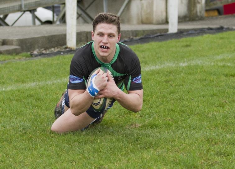 Joe Hutchings dives over for a try for The Otters. Picture by Elwyn Davies
