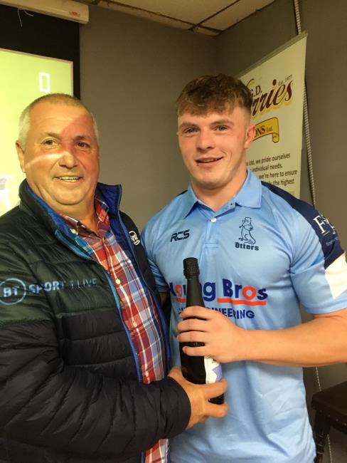  Caine Rees-Jones receives his man of the match award at Narberth