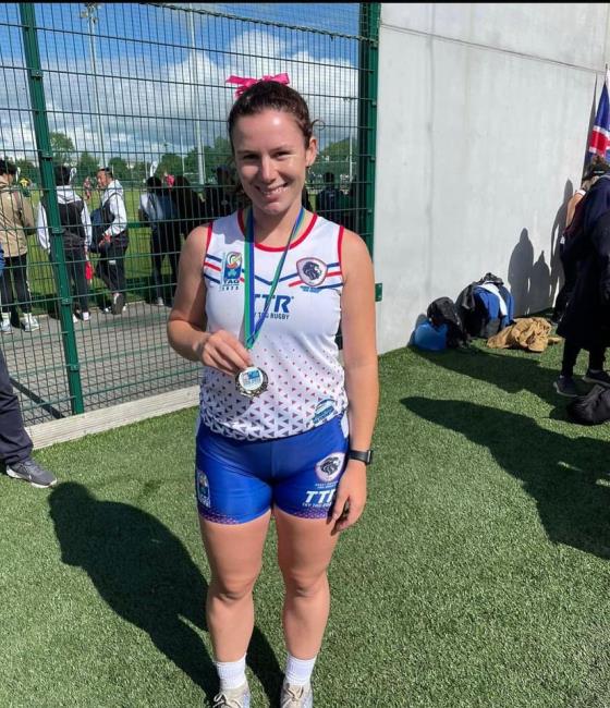 A proud Jess Charles shows off her silver medal