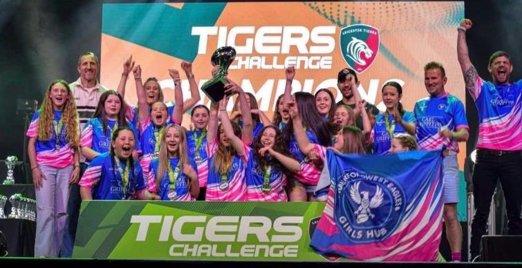 The girls and coaches celebrate success in the Bognor Regis Leicester Tigers Challenge