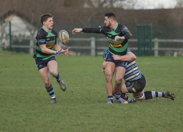 Narberth centre Jack Price passes to team-mate Joe Hutchings