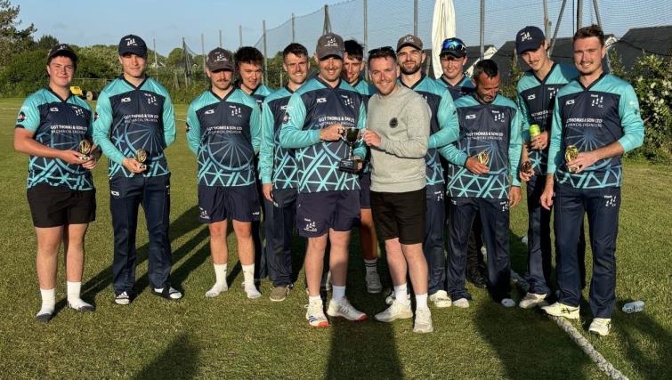 Bradley Flood and his winning Hook Black Diamonds team