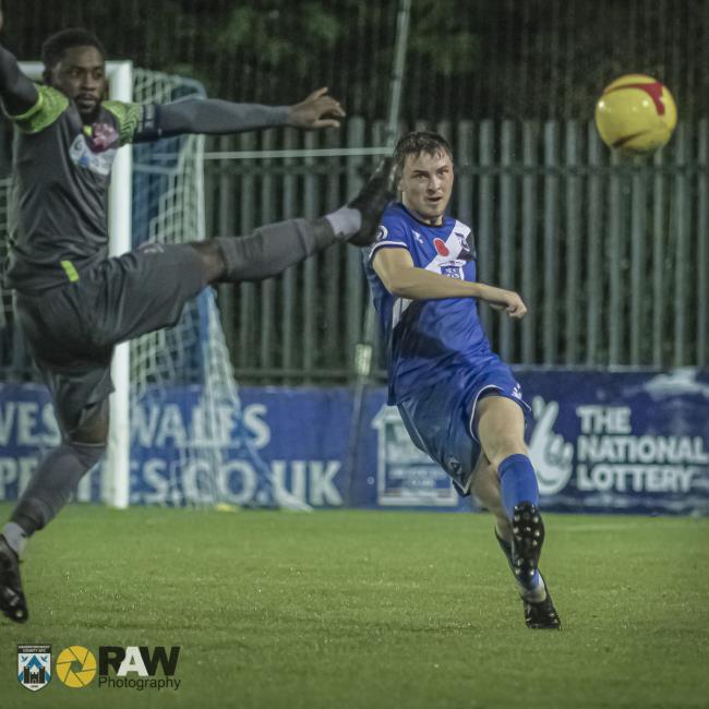 Alaric Jones pumps the ball forward
