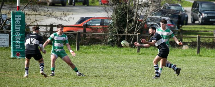 Craig Barnett tries hard to set up an attack for The Quins. Curtesy Newcastle Emlyn RFC