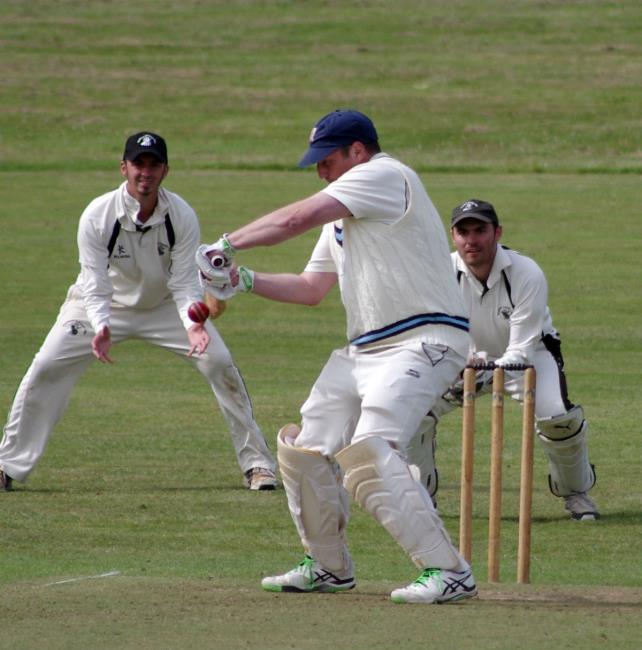 Simon Holiday flashes a four through the covers