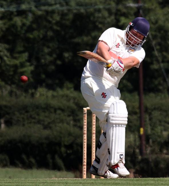 Harry Thomas smashes a boundary for Lawrenny