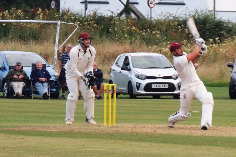 Where did that go? Iwan Izzard belts one of his seven sixes!