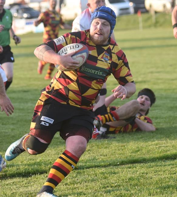 Aaron Tomkinson on the charge