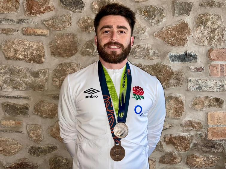 Greg Brown with Medal