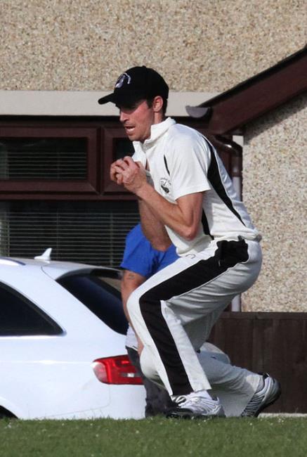 Patrick Hannon takes a catch just   inside the boundary 
