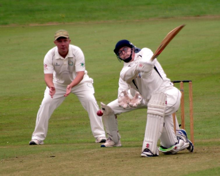 Ashley Sutton hits a six 