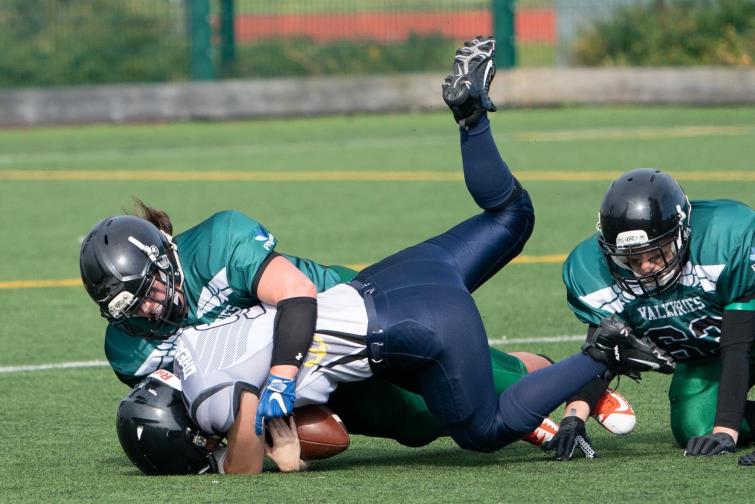 Zoe John  - puts in a crunch tackle