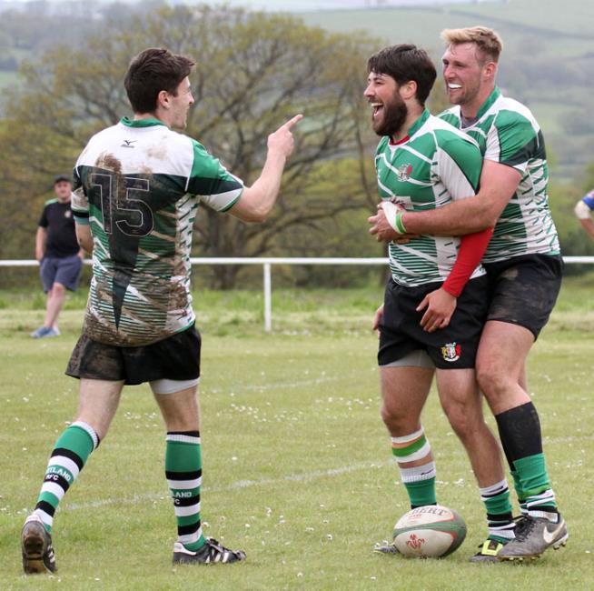 Johnny and Josh Thomas congratulate Nico Satoro 