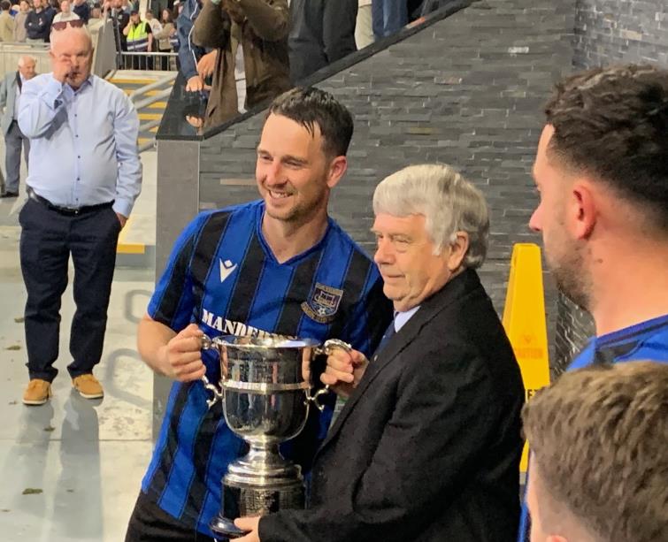 Daisy Picton sheds a tear as Ryan Wilson collects the trophy