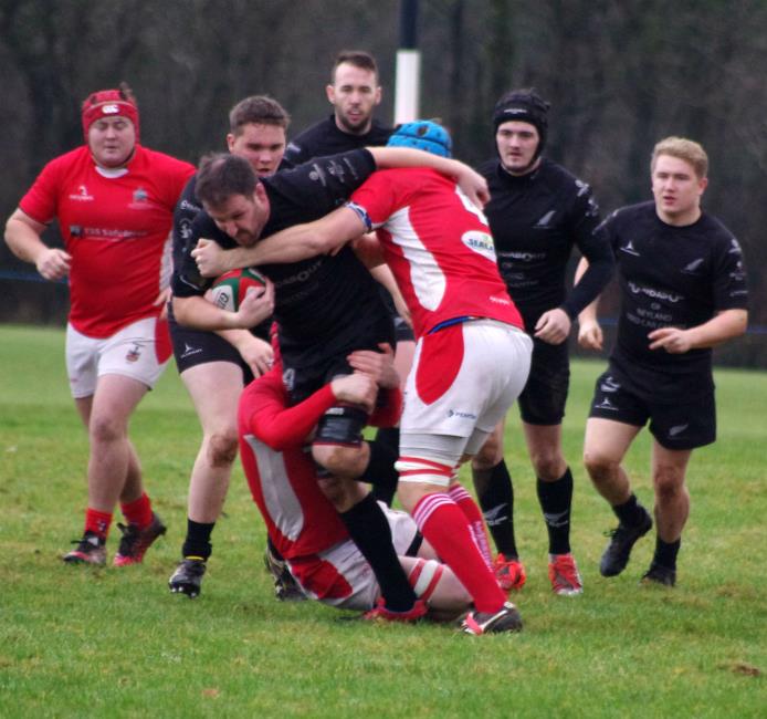 Skipper Mark James drives hard for Neyland