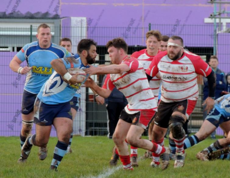 Mike Georgiou on a charge for The Saints