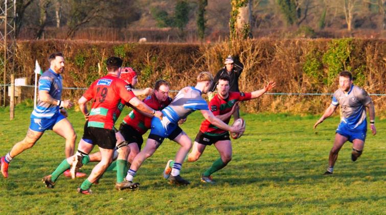 Archie Thomas gets the ball away for Haverfordwest (Pic Billy John)