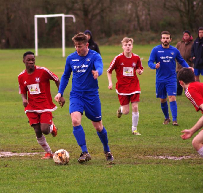 Ashley Beck dribbles forward