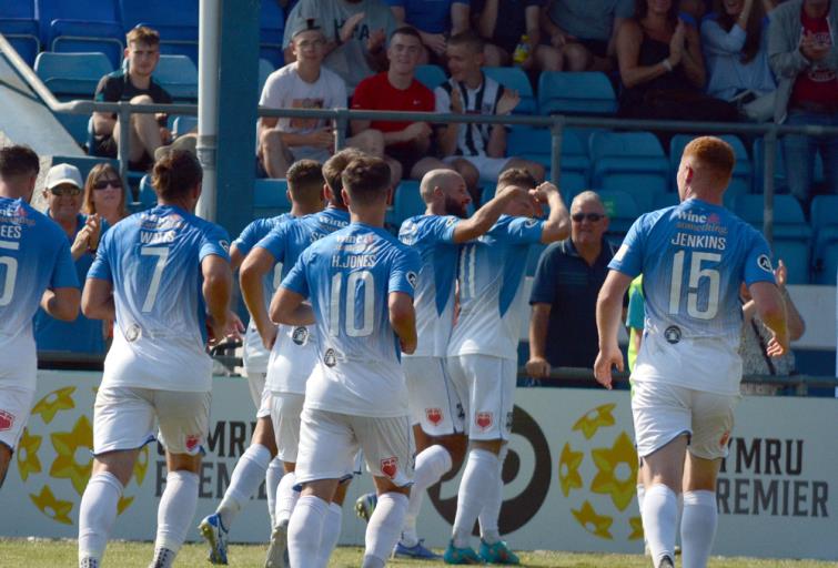 Haverfordwest County celebrate the solitary goal by Jordan Davies