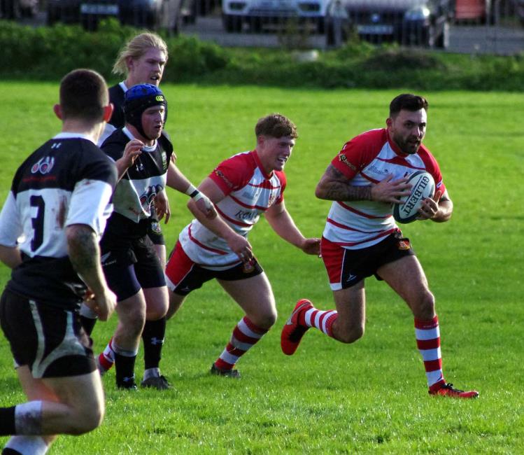 Craig Barnett looks to attack