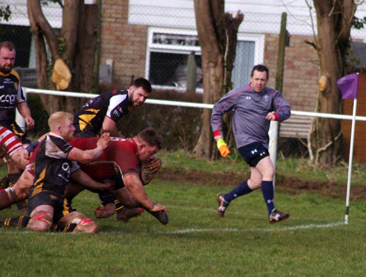 Dom Colman pounces for a try for Pembroke against Deri