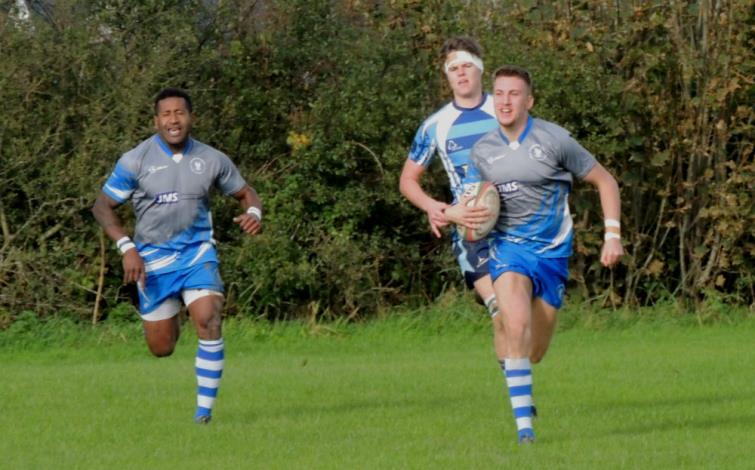 Elgan Roberts scores the first  try