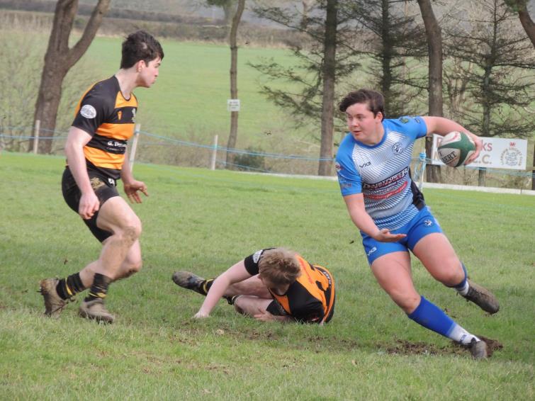 Fishguard winger Will James on the burst