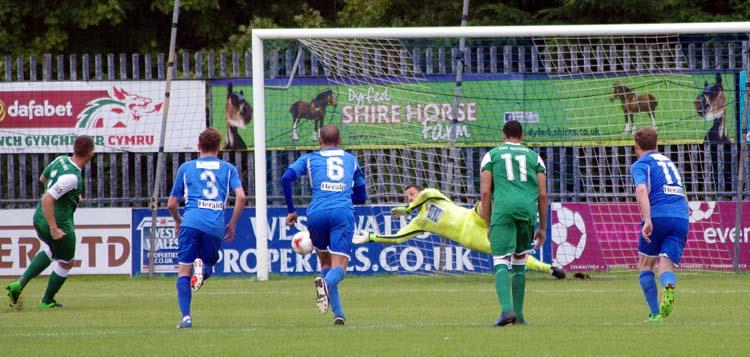 James Gwilt pulls off a brilliant save to deny Bobby Briers scoring from the spot