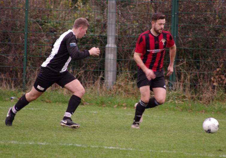 Goodwicks Jonny Horgan causes problems down the left wing for Neyland