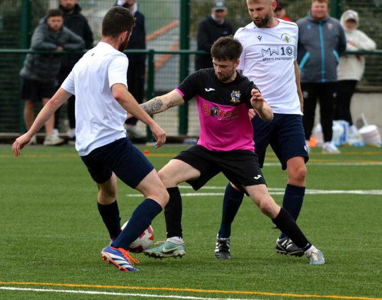 Jordan Thomas puts in a big tackle to stop a Swifts attack