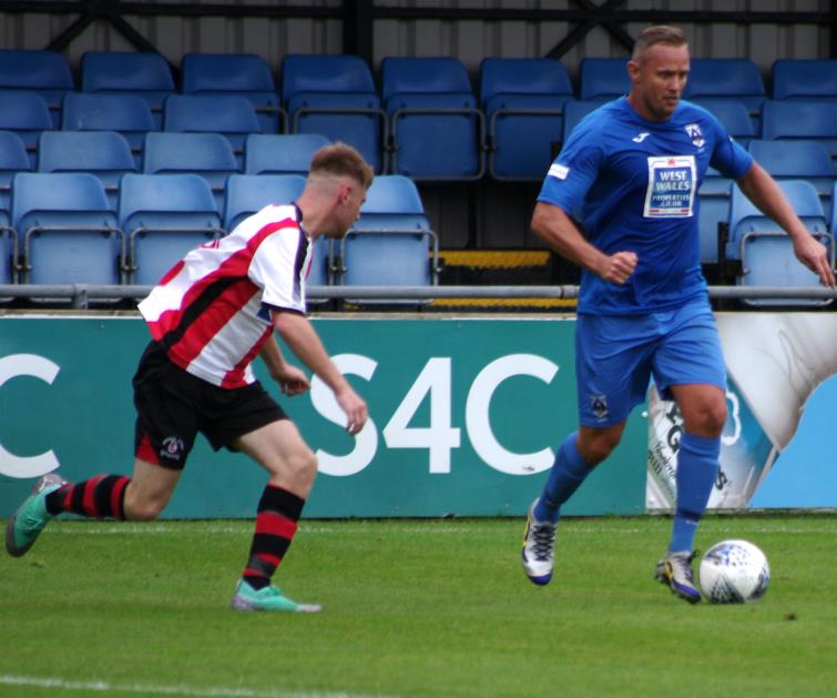Lee Trundle was in the thick of the action and scored from the spot