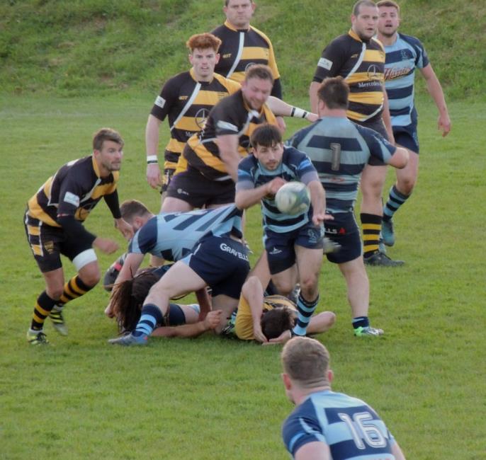 Lewys Gibby gets his backs in motion