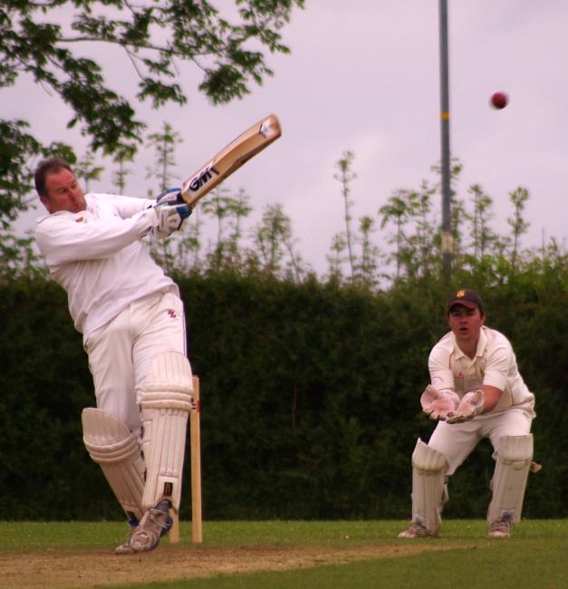 Phil Sutton smashes a boundary for Burton