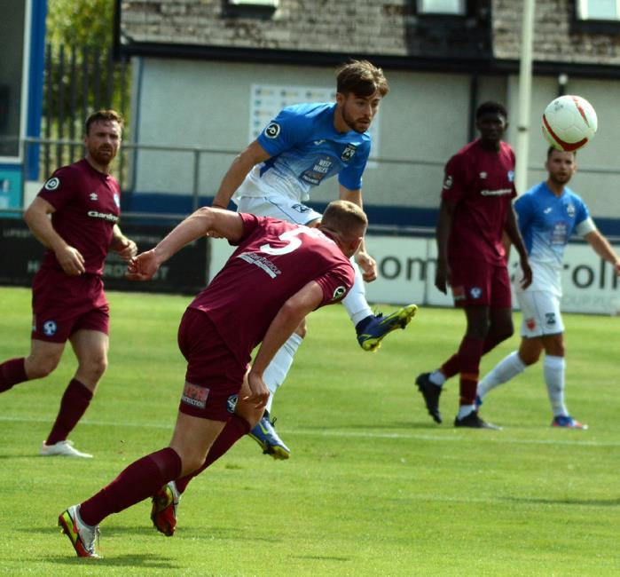 Ryan George pumps ball upfield