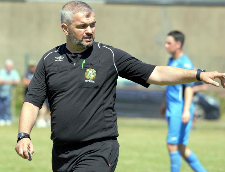 Referee Craig Templeton had a tough afternoon in the middle