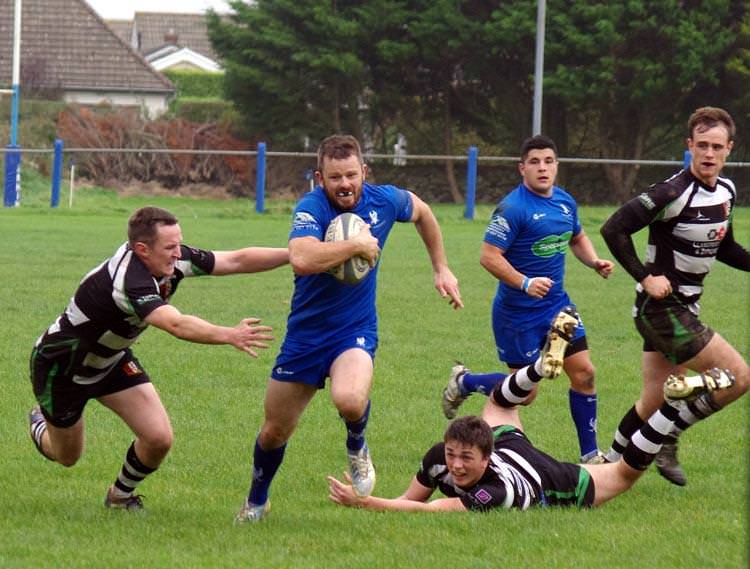 Steve Williams makes a telling midfield break for The Blues
