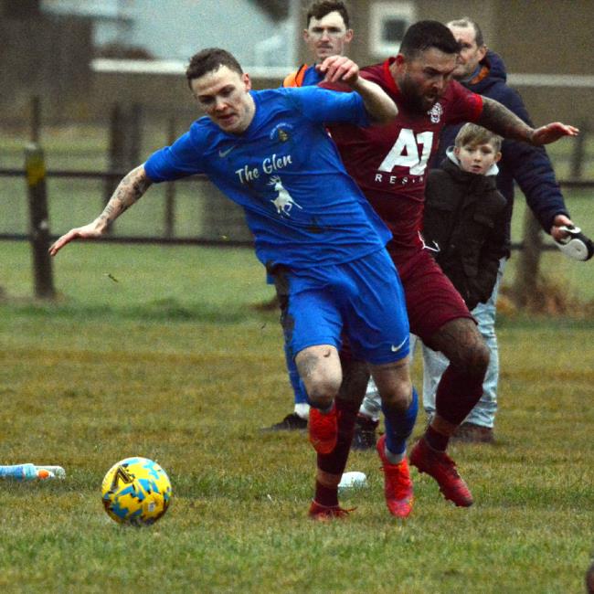 Bridge wide sided midfielder Will Haworth is put off balance