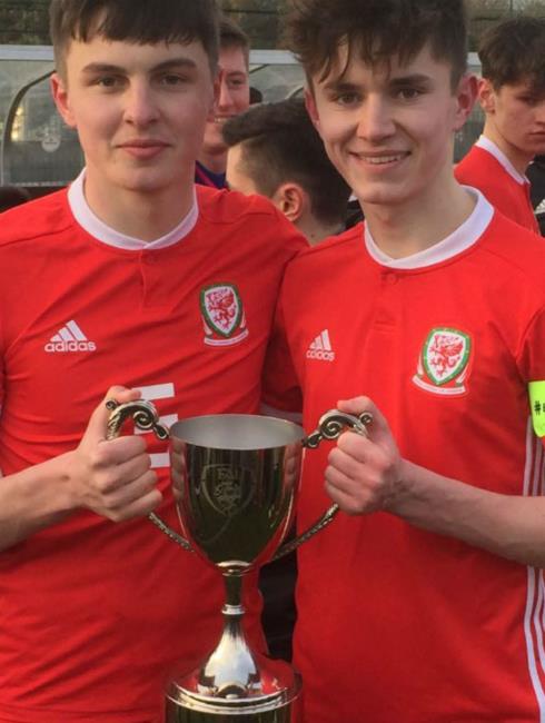 Alaric Jones (left) with the John Coughlan Memorial Cup