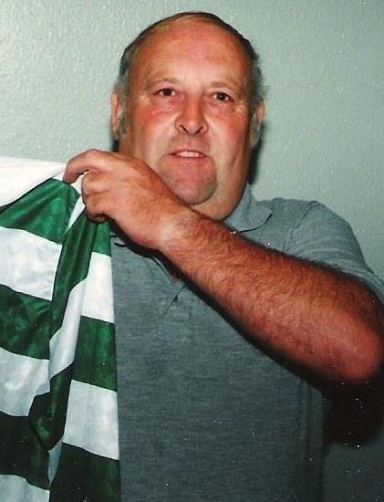 Mike Hughes showing off a new club shirt