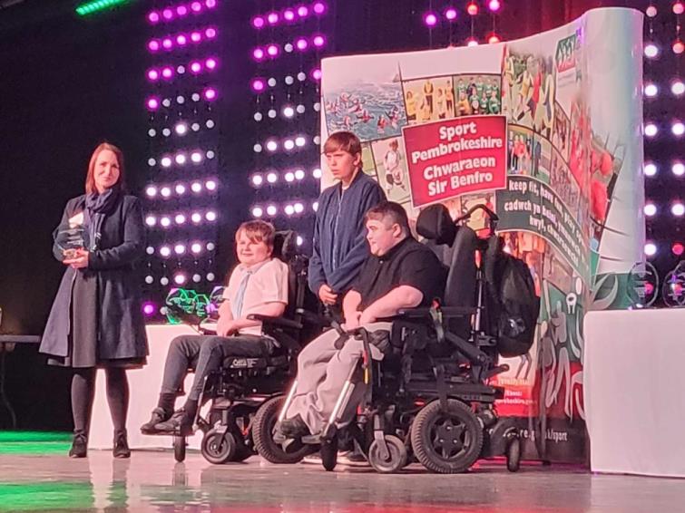 Ioan receives his trophy at the Sport Pembrokeshire Awards