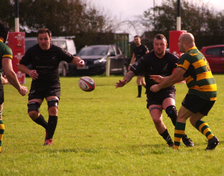 Mark James and Chris Busby defend well for Neyland