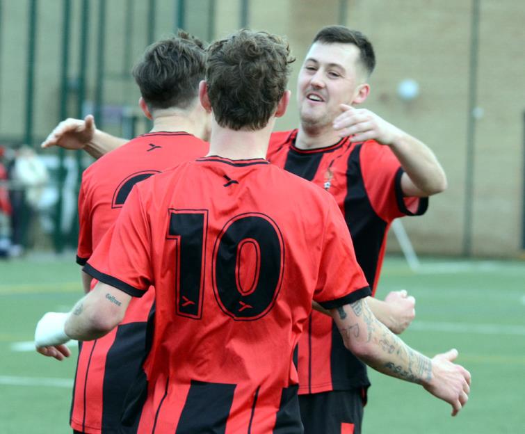 Goodwick United celebrate scoring against The Wizards. Picture Gordon Thomas