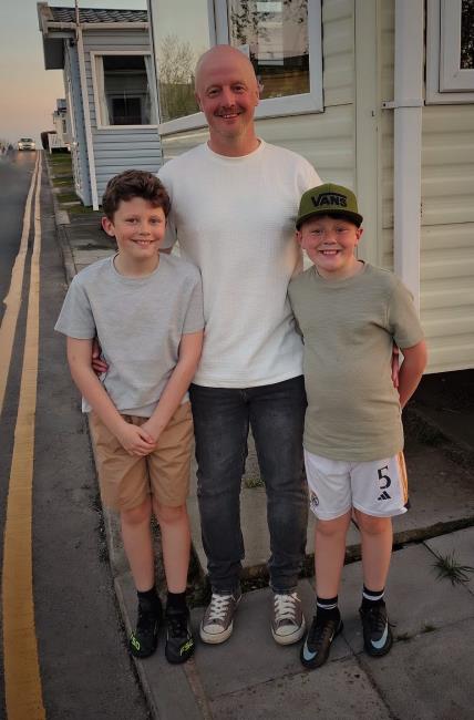 Andrew with his boys Joseph and Cody, who are his pride and joy