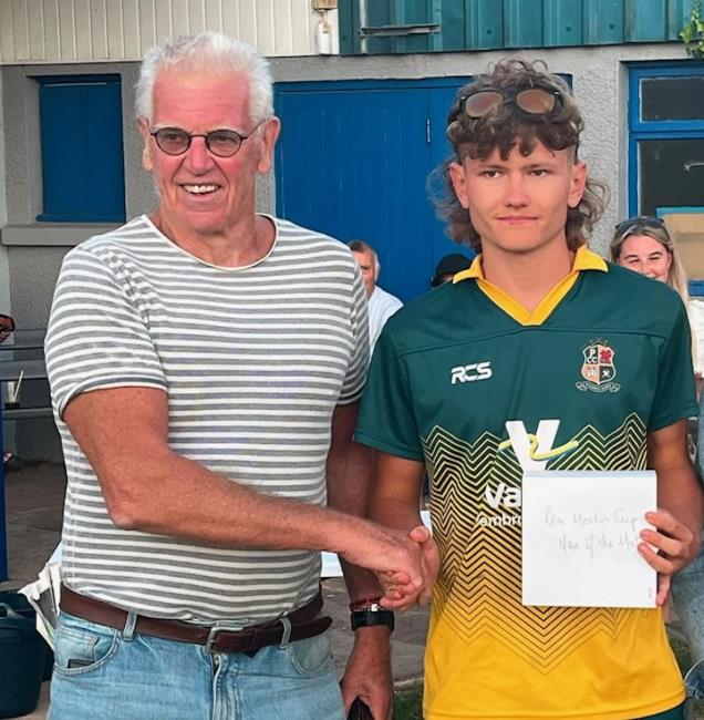 Adjudicator John Owen with Man of the Match Ollie Donohoe